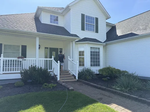 Grime Guyzz exterior house wash on a two-story colonial in Medina, Ohio